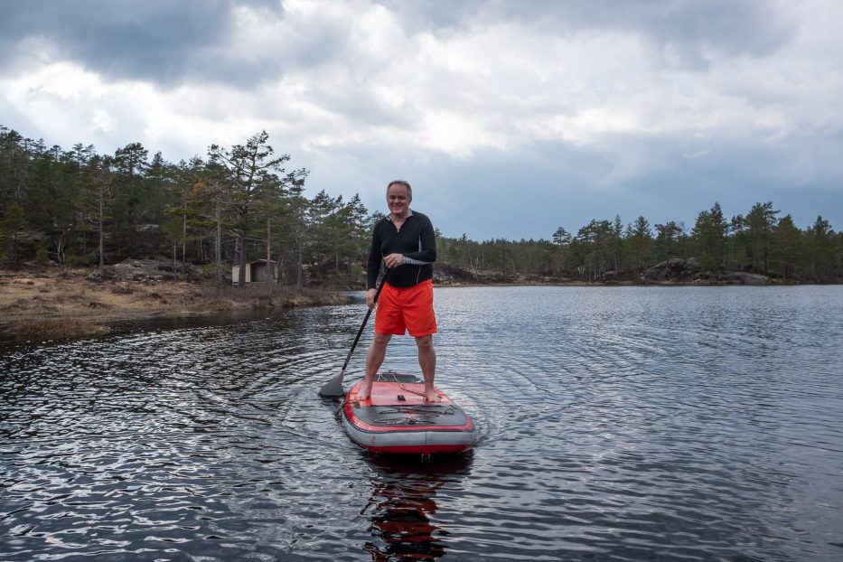 a man trying SUP at Canvas Telemark