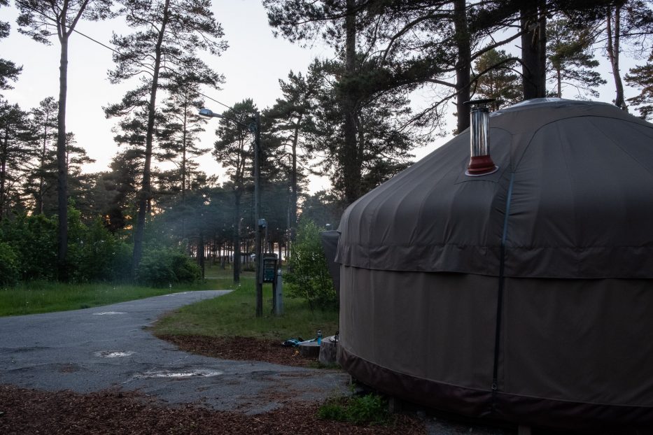 Smoke coming out from a luxury yurt during sunset at Canvas Hove