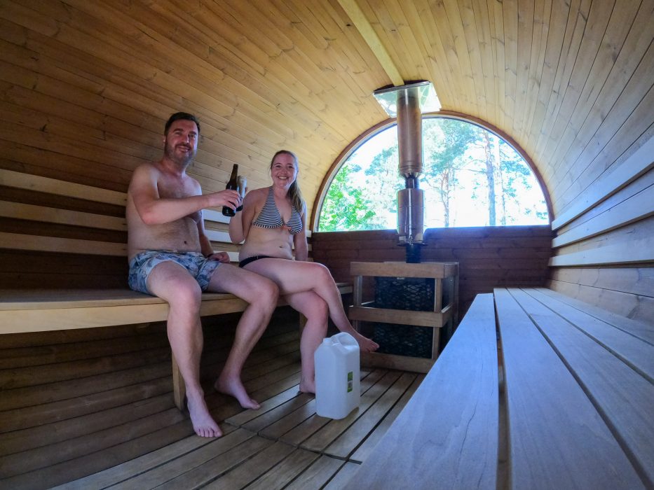 man and woman having a toast in the sauna at canvas hove