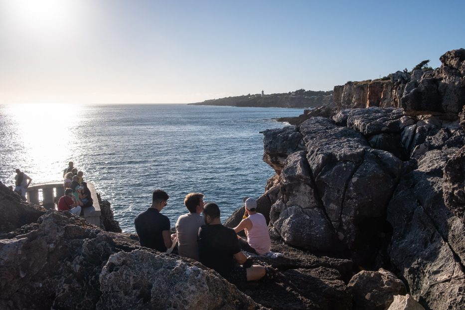 several people enjoying the view out at Boca D'Inferno