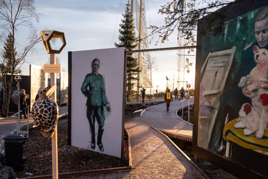 different paintings and installations at roseslottet with people walking inside the artwork in the sun