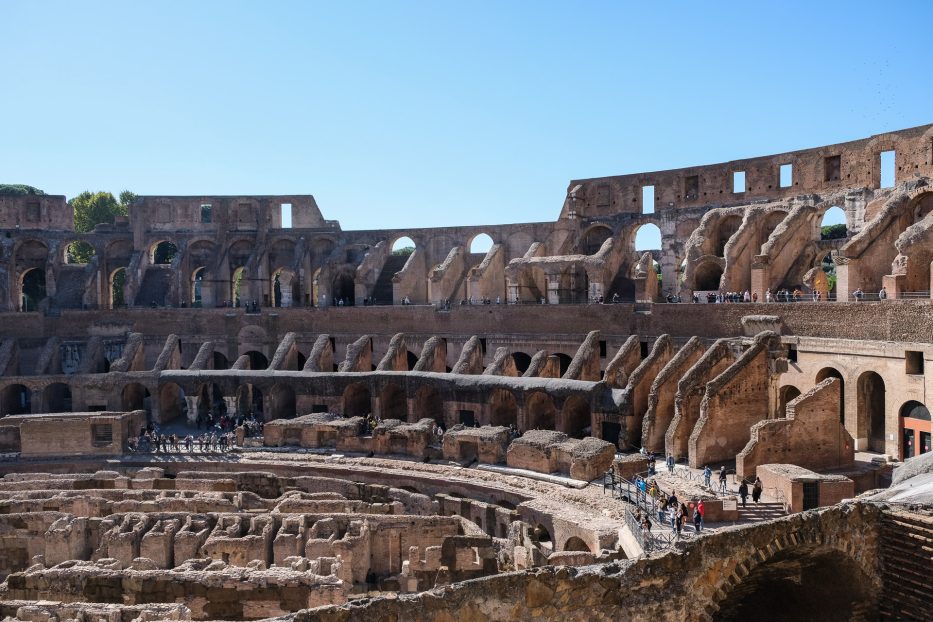 colosseum in rome with a blue sky