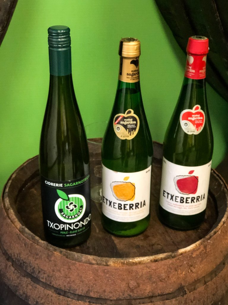 different bottles with Spanish cider