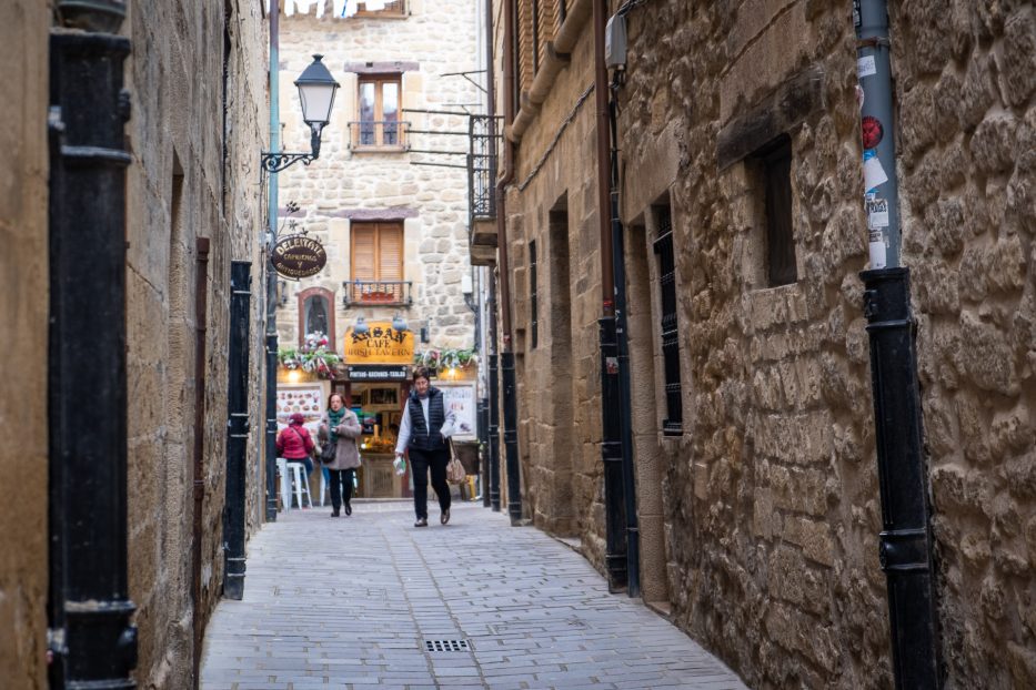 people walking in the narrow streets of Laguardia in spain