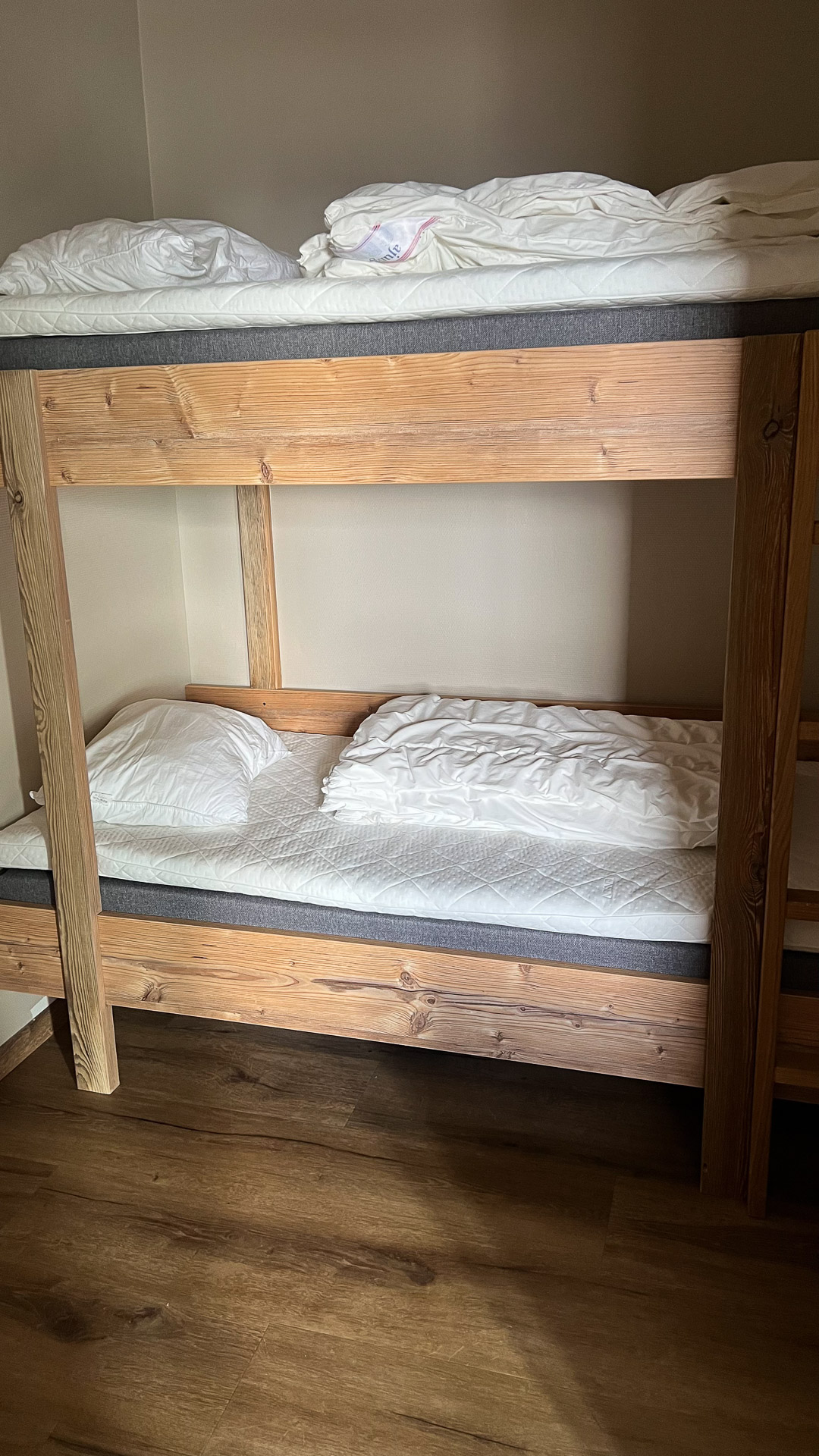 a small room with a bunk bed