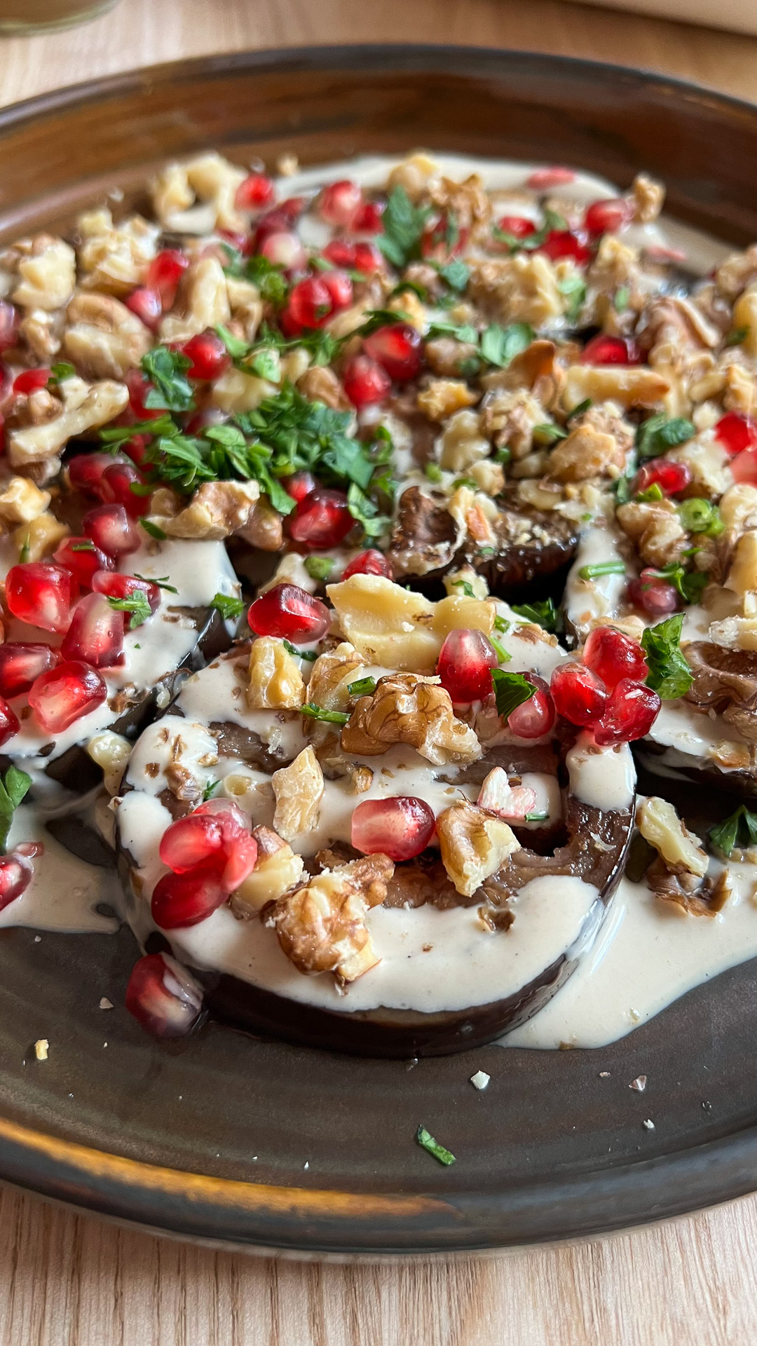 vegetarian dish with eggplants and pomegranate