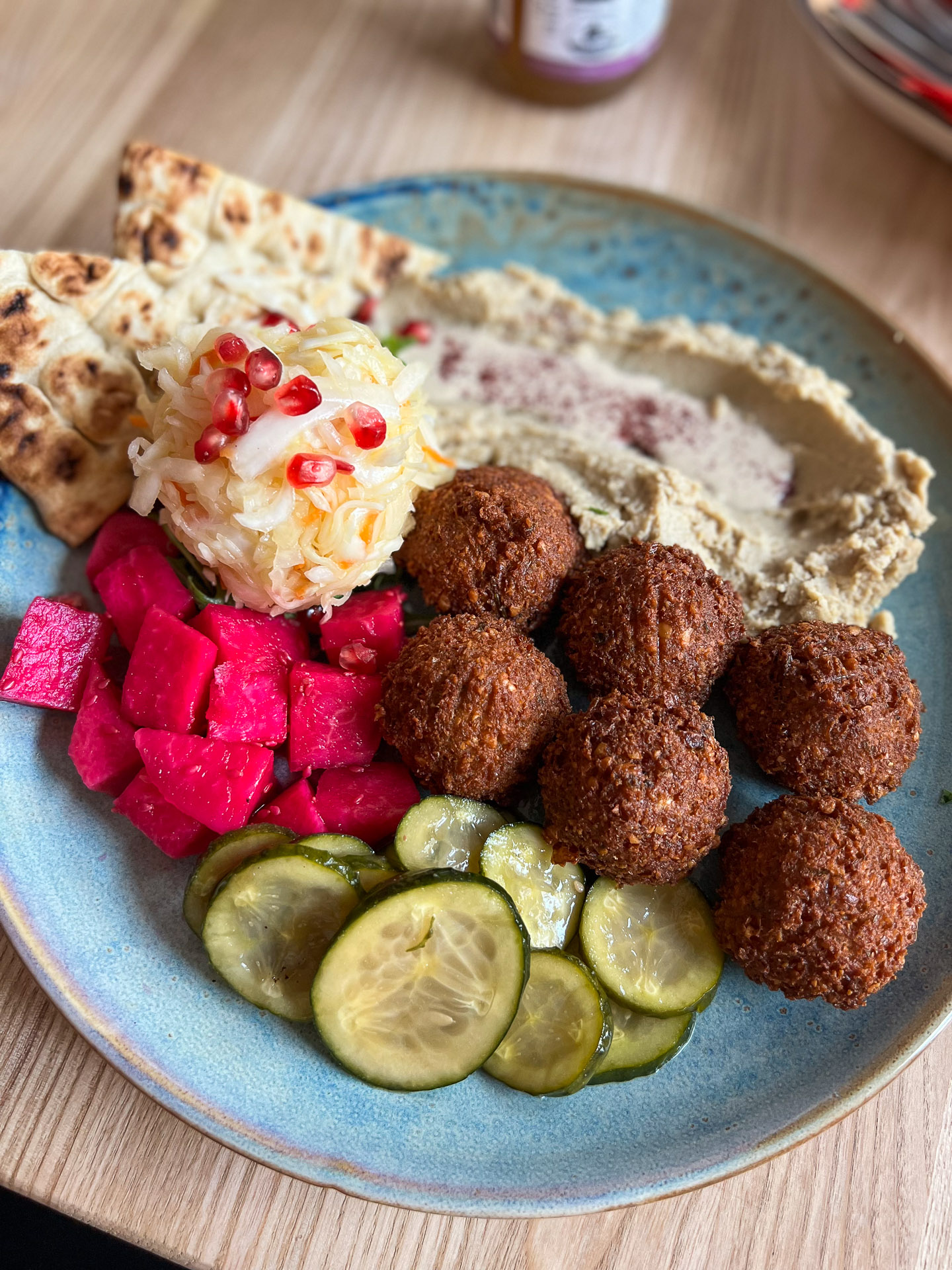 falafel and hummus at restaurant toli toli