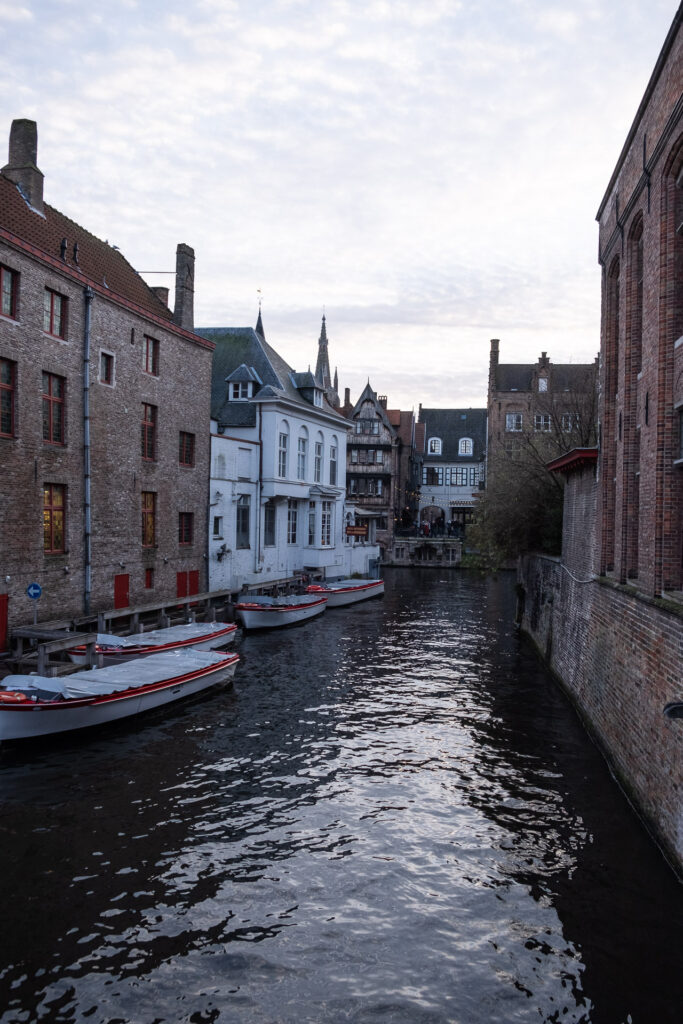 canal with boats in bruges