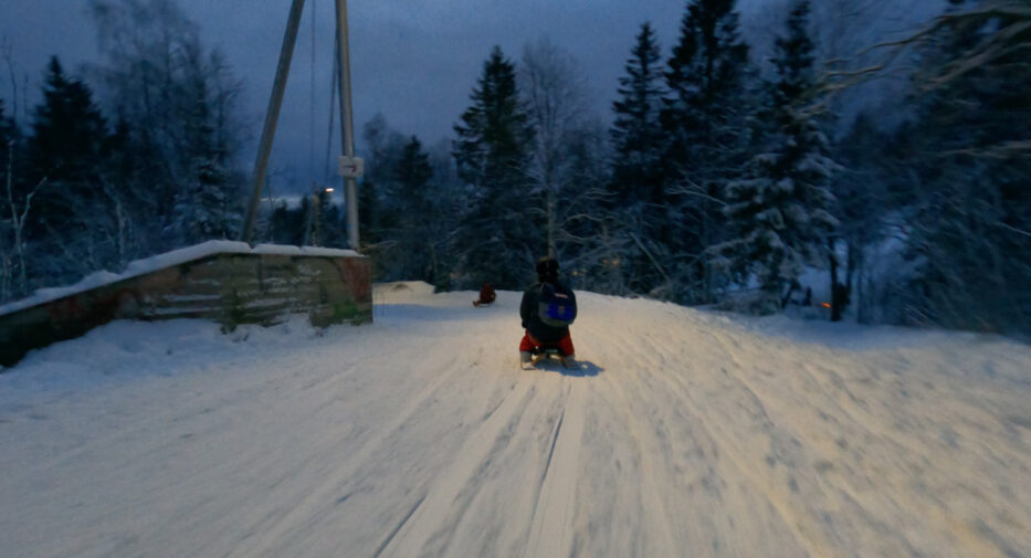 person bobsledding in korketrekkeren in oslo norway