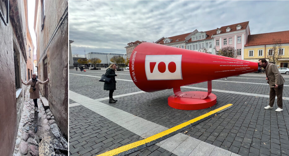 en trang gate og et kunstverk på torget i vilnius litauen