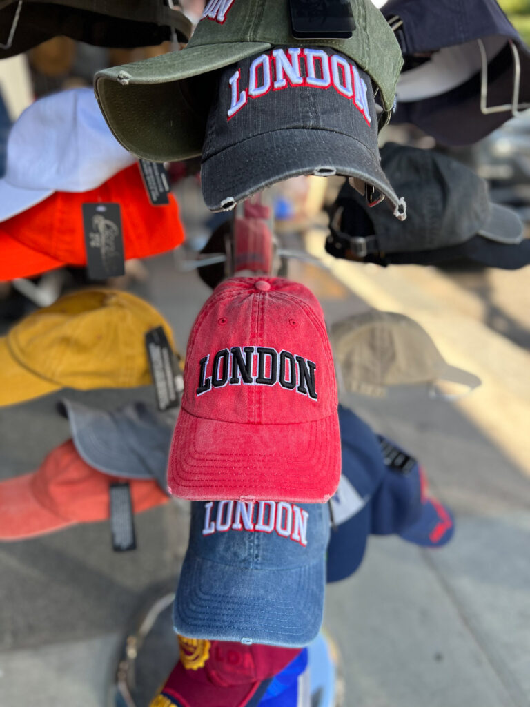 colourful capses with london embroidered on them