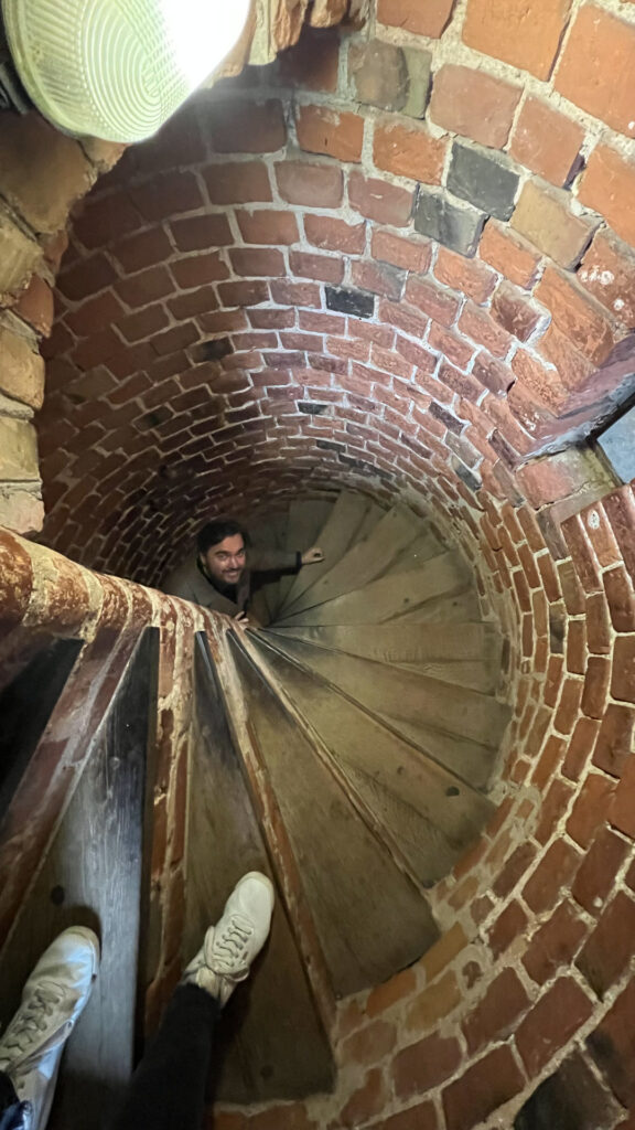 a steep and narrow staircase inside one of the towers in trakai castle