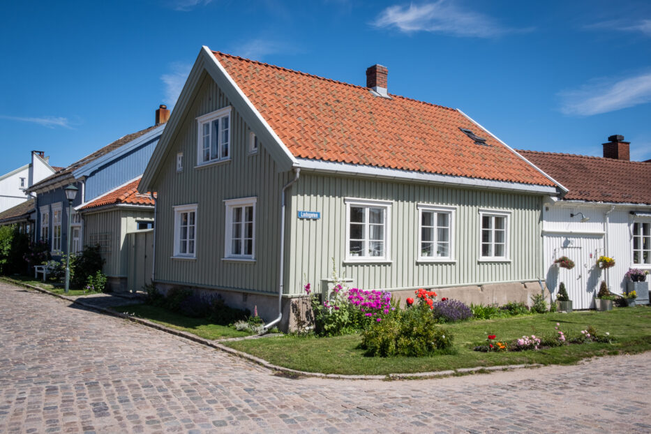 et grønt hus med rødt mursteinstak på vaterland