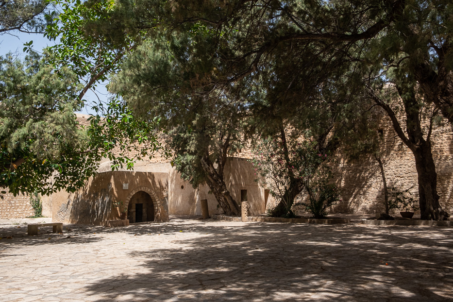 a fortress and trees casting nice shadows in tunisia