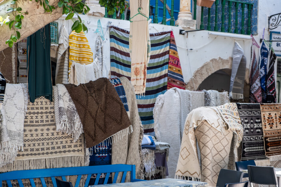 colourful garments and carpets on display in mahdia